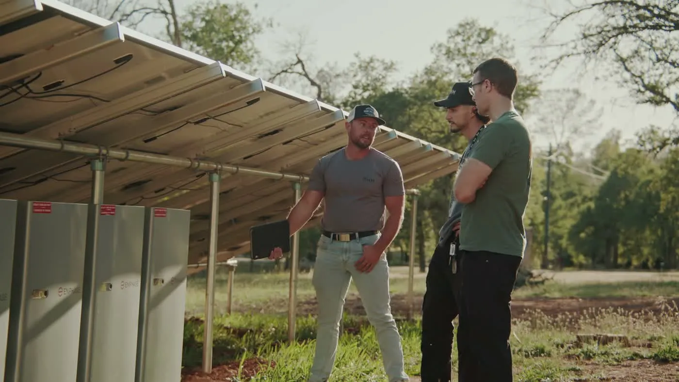OHM team working on a solar array
