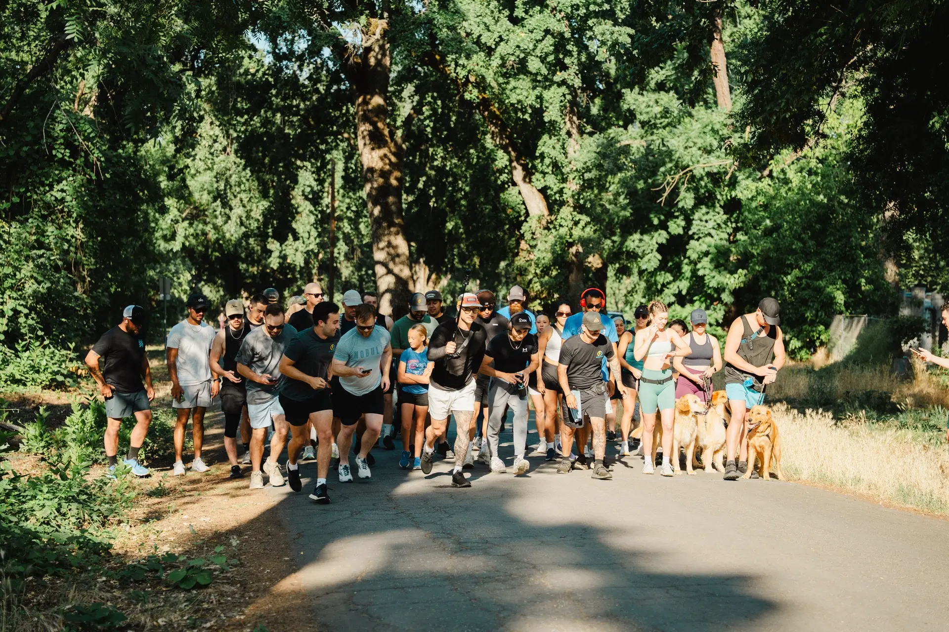 A group setting off along the park path at the OHM 5K