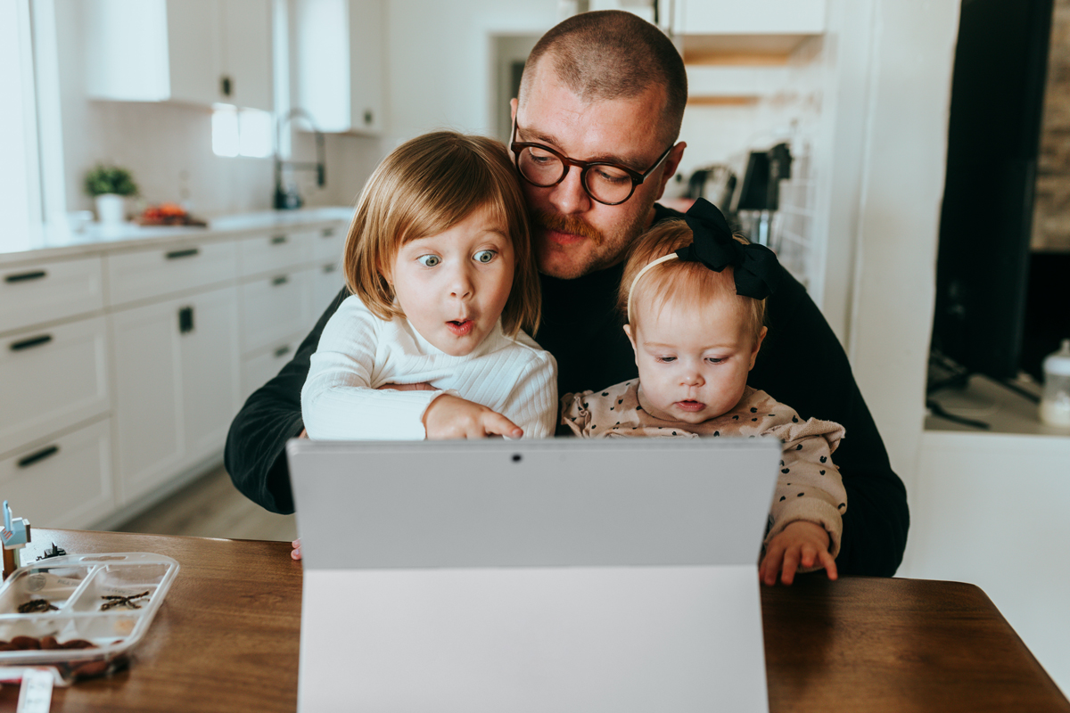 Family checks smart home from tablet